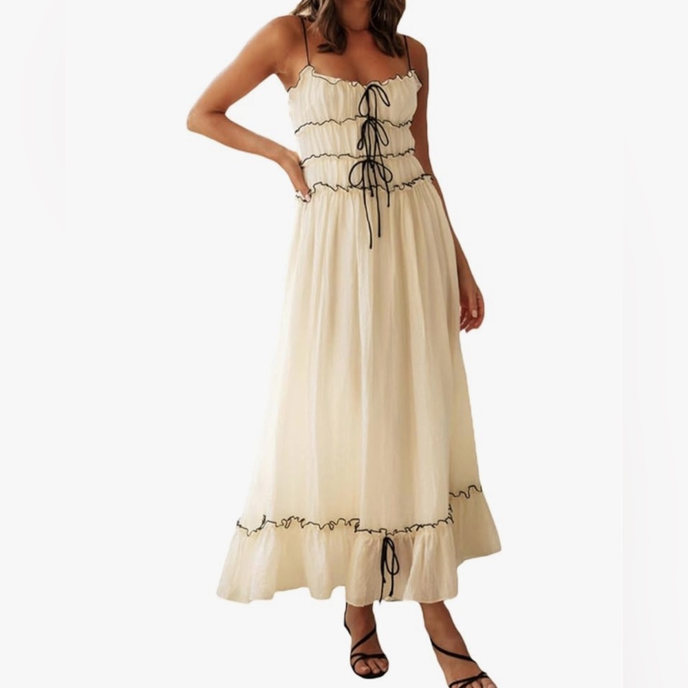 Brand new never worn white dress with black bow detail